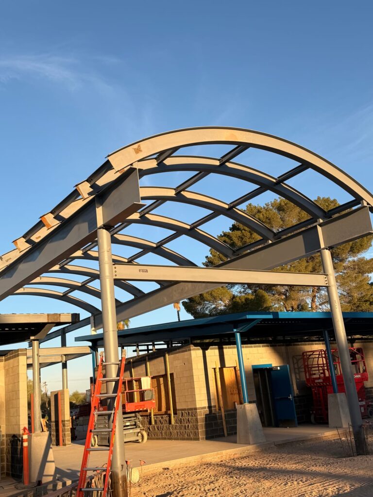 Curved steel canopy at Mission Manor Park splash pad, Tucson AZ